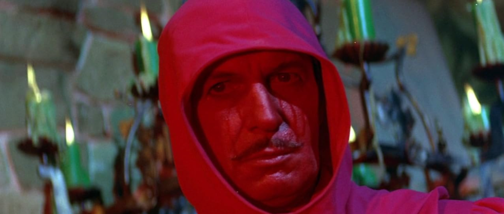 The Red Death reveals his face... and it is the face of Vincent Price!